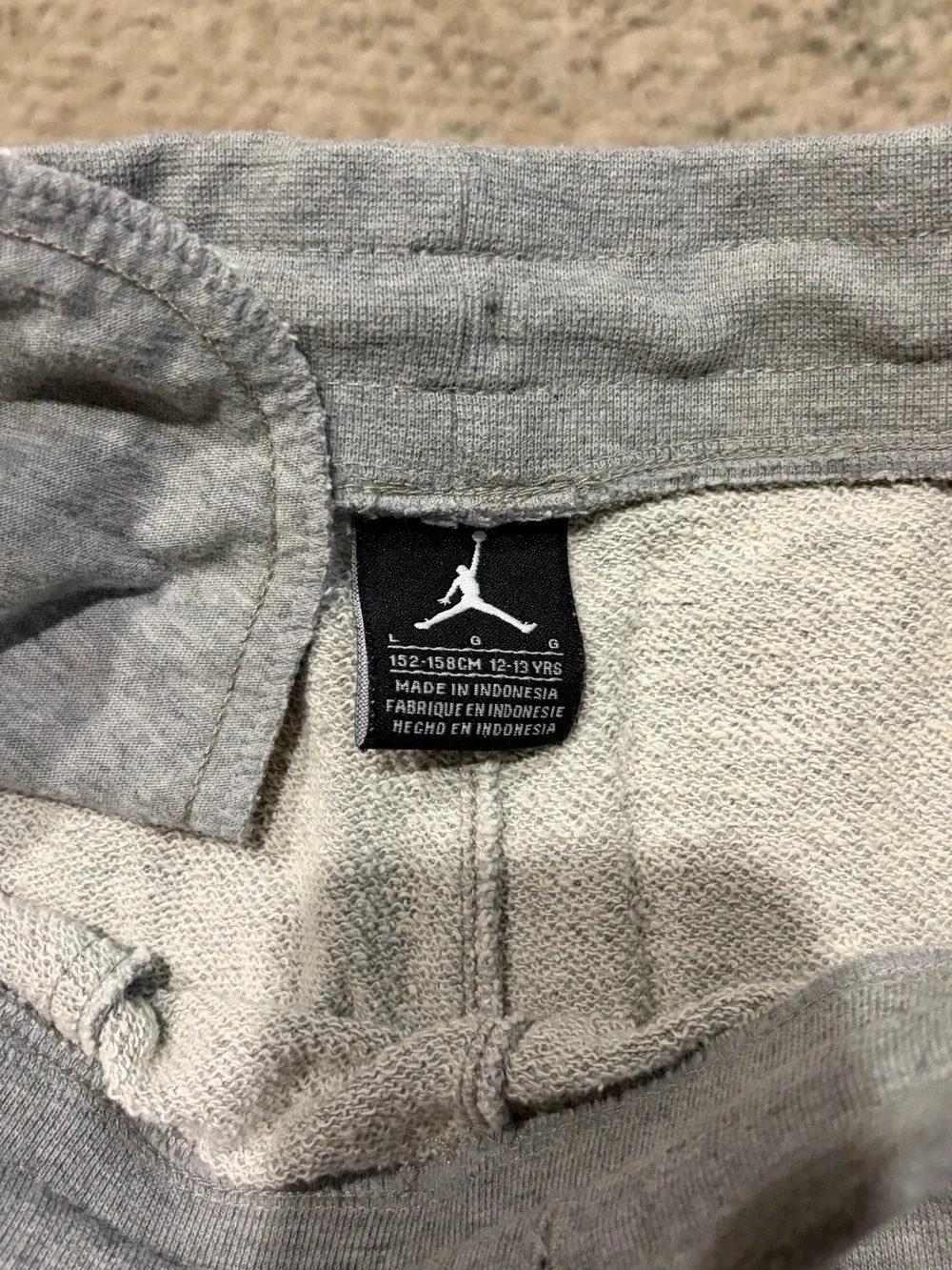Jordan Men’s Light Gray Athletic Fleece Shorts with Black Jumpman